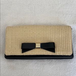 Kate spade leather and straw clutch with bow
